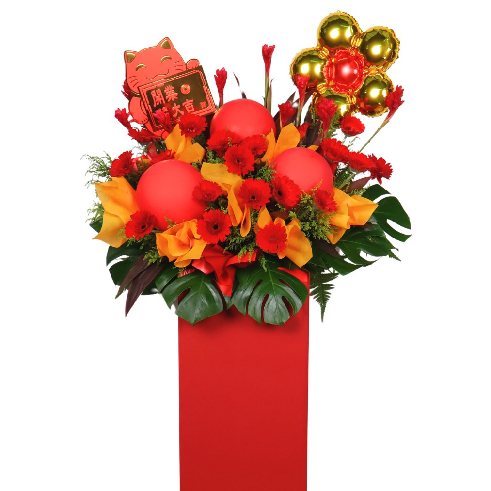Red and yellow flower bouquet in vase.