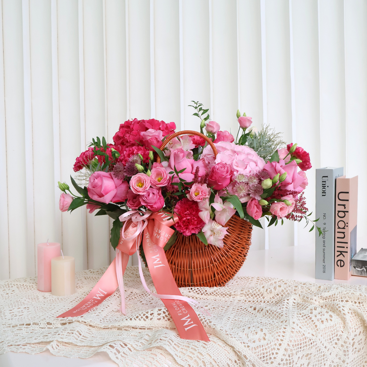 Pink garden rose flower bouquet with artificial flowers.