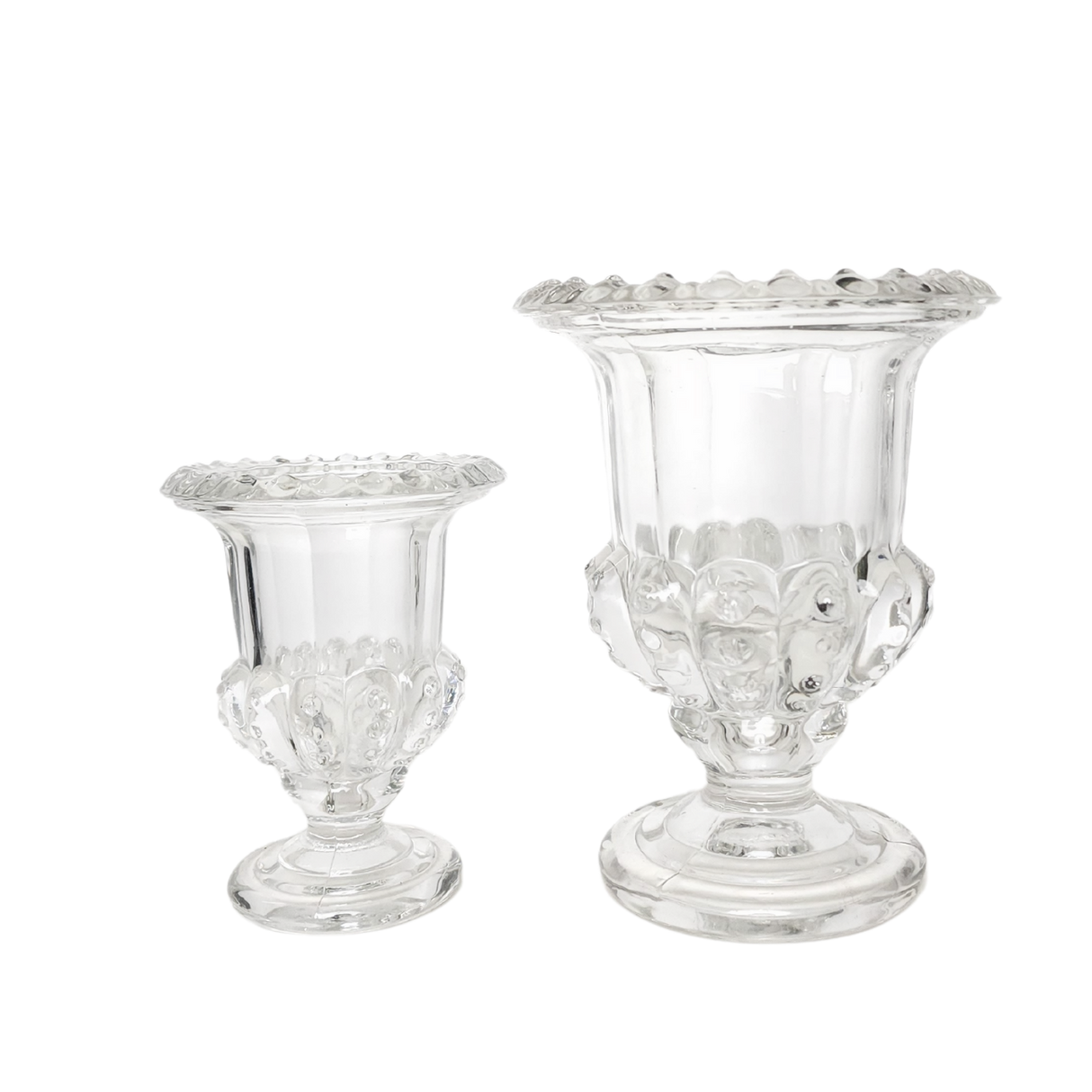 Natural material candle holder with geraniums.