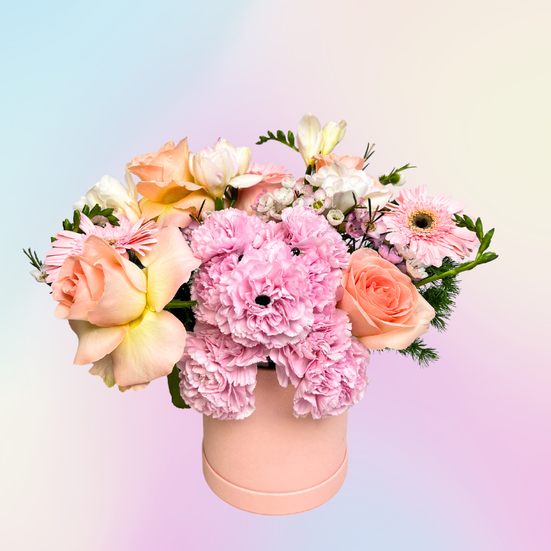 Pink flower bouquet in vase.