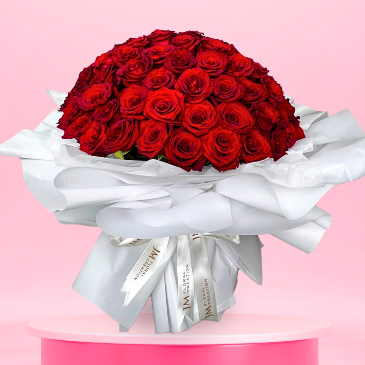 Colorful flower bouquet with garden roses and pink petals.