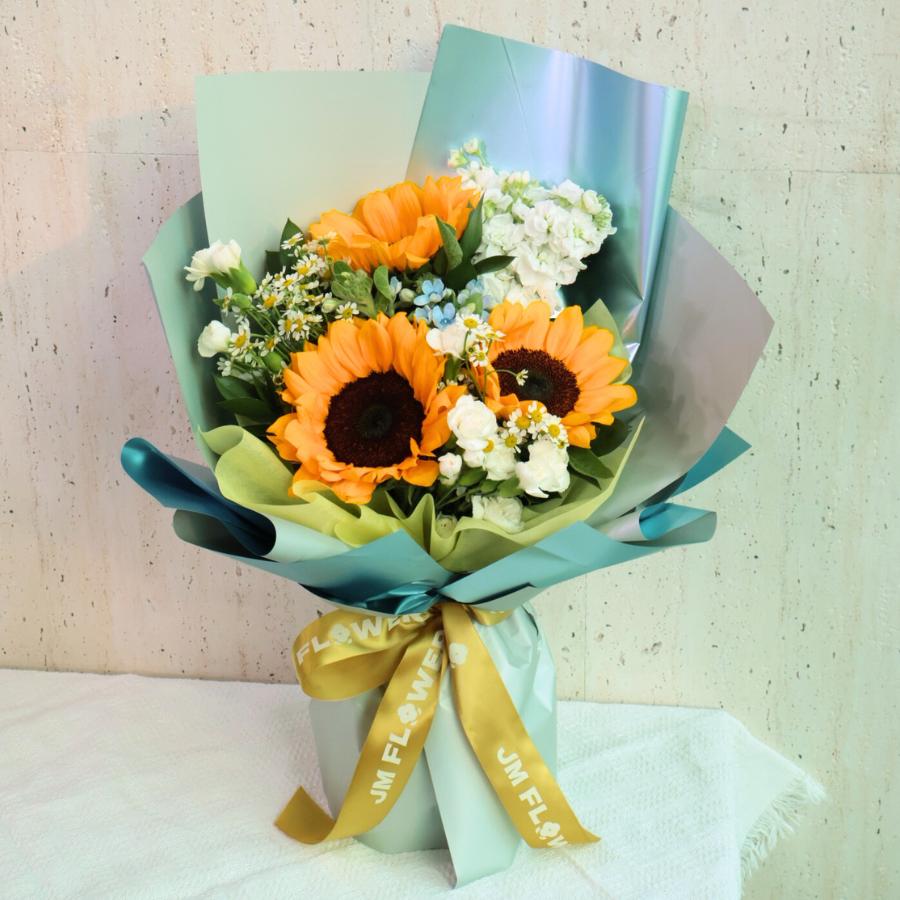 Yellow artificial flower bouquet with petals.