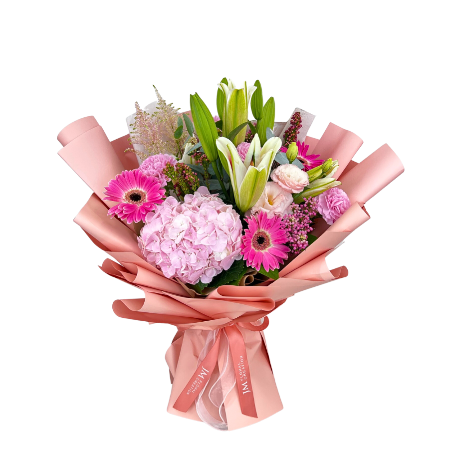 Pink artificial flower bouquet with petals.
