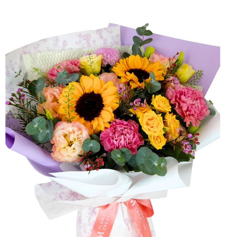 Yellow and pink flower bouquet with garden roses.