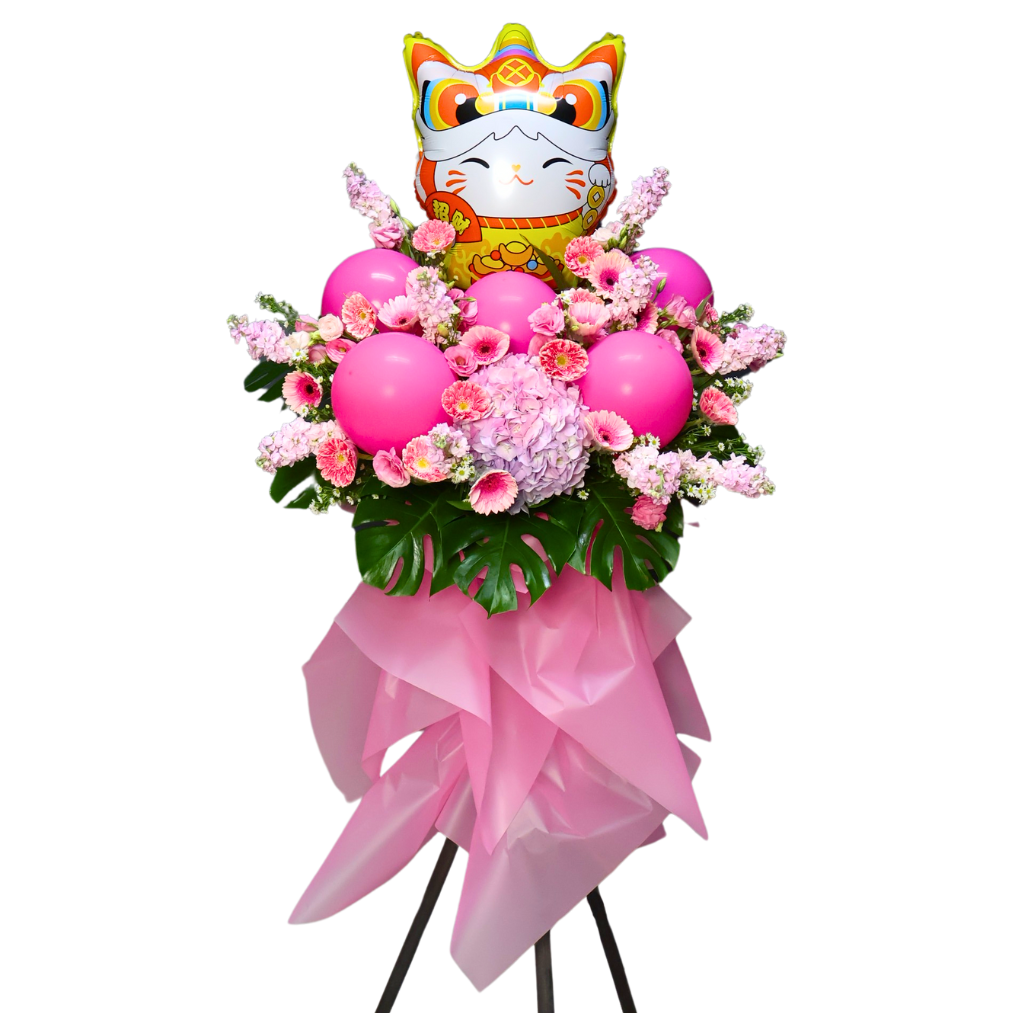 Pink artificial flower bouquet with toy floral design.