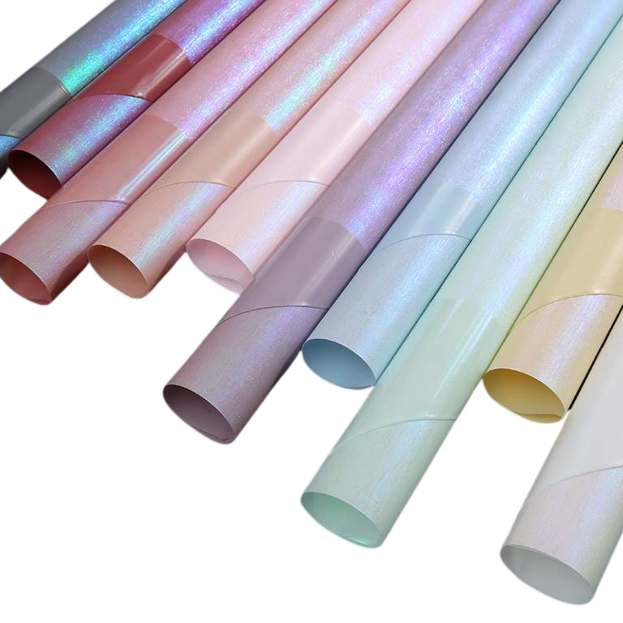 Pink paper and office supplies on desk.