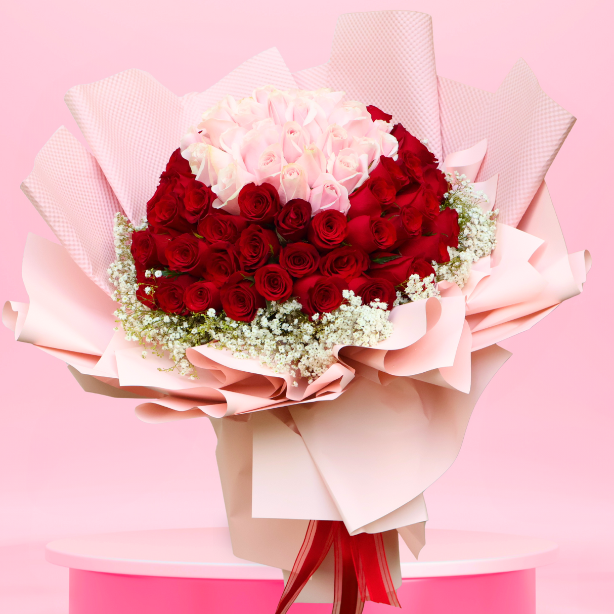 Pink flower bouquet with petals.