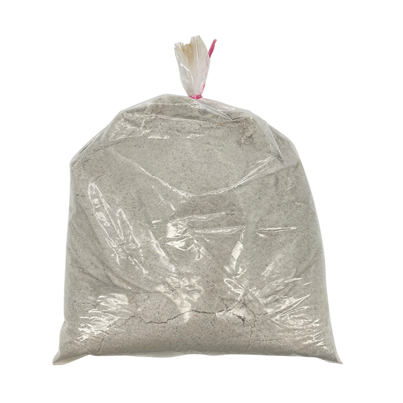 Plastic shower cap and powder on pillow.