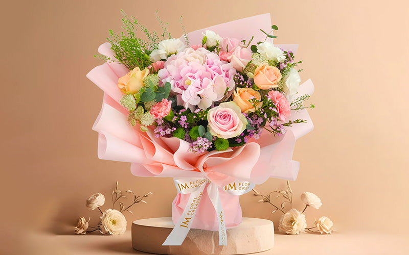 A pink flower bouquet from JM Floral Creation.