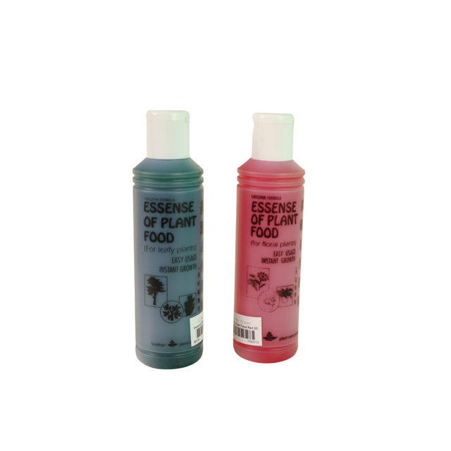 Pink plastic bottle of liquid personal care solution spray.
