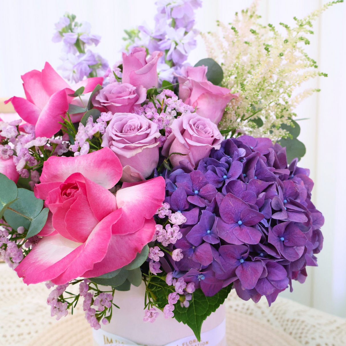 Violet Bliss (3 Mattiola, 3 Roses, 1 Hydrangea) - Table Flower Arrangement