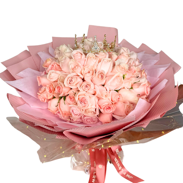 Pink garden rose bouquet with floristry arrangement.