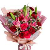 Nurturing Delights (2 Lilies, 10 Carnations)
