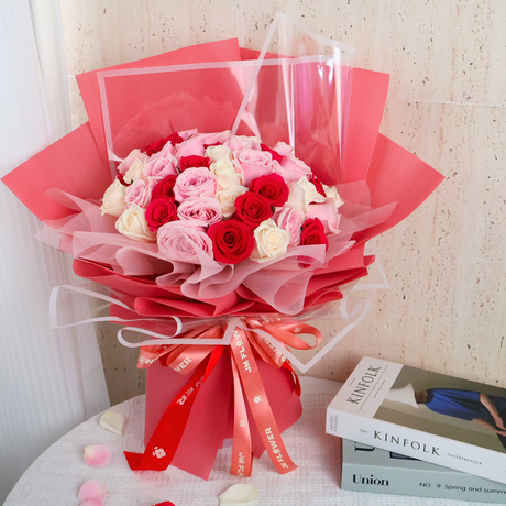Pink flower bouquet in box.